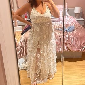 White maxi dress with 3d floral appliqué